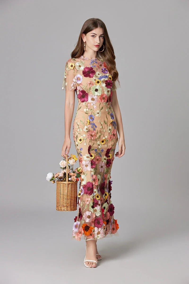 Model wearing the Aurelia 3D floral appliqué sleeveless maxi dress in purple