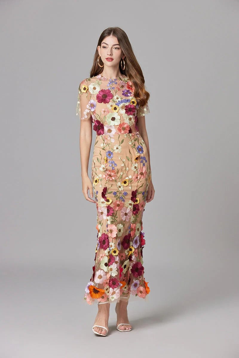Back view of the Aurelia column maxi dress with sheer mesh overlay in purple