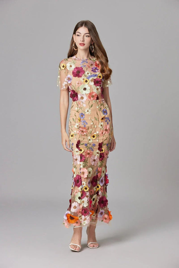 Back view of the Aurelia column maxi dress with sheer mesh overlay in purple