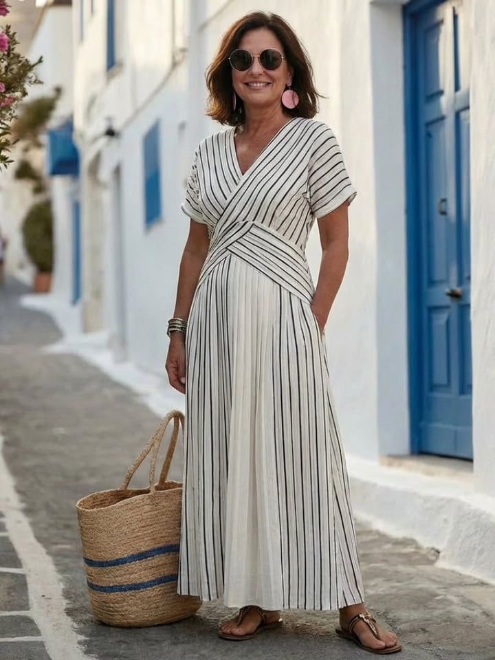Back view of the Aurelia white striped wrap midi dress showing the short sleeves and midi length