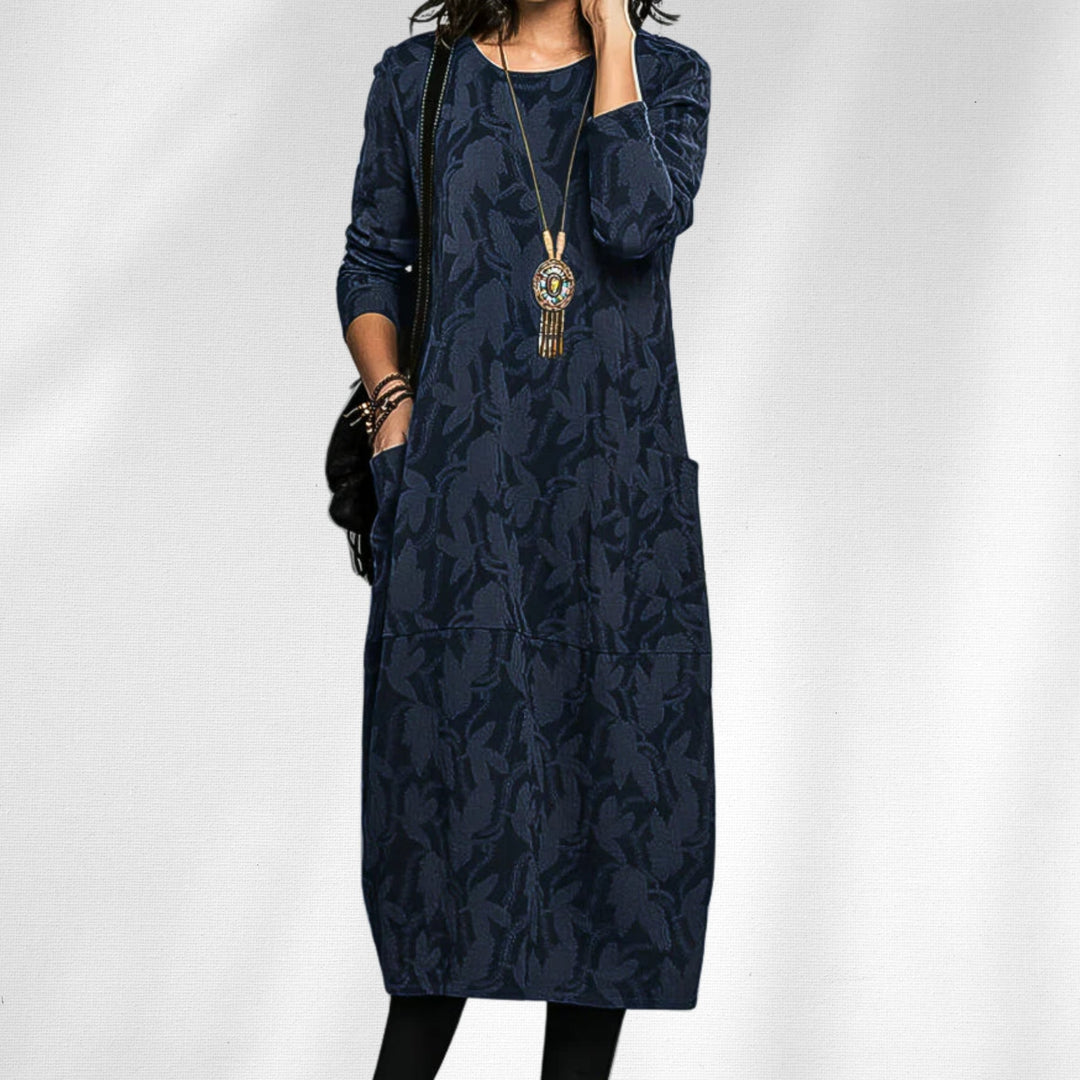 Full-length view of the winter dress styled with boots, available in green, burgundy, blue, and black