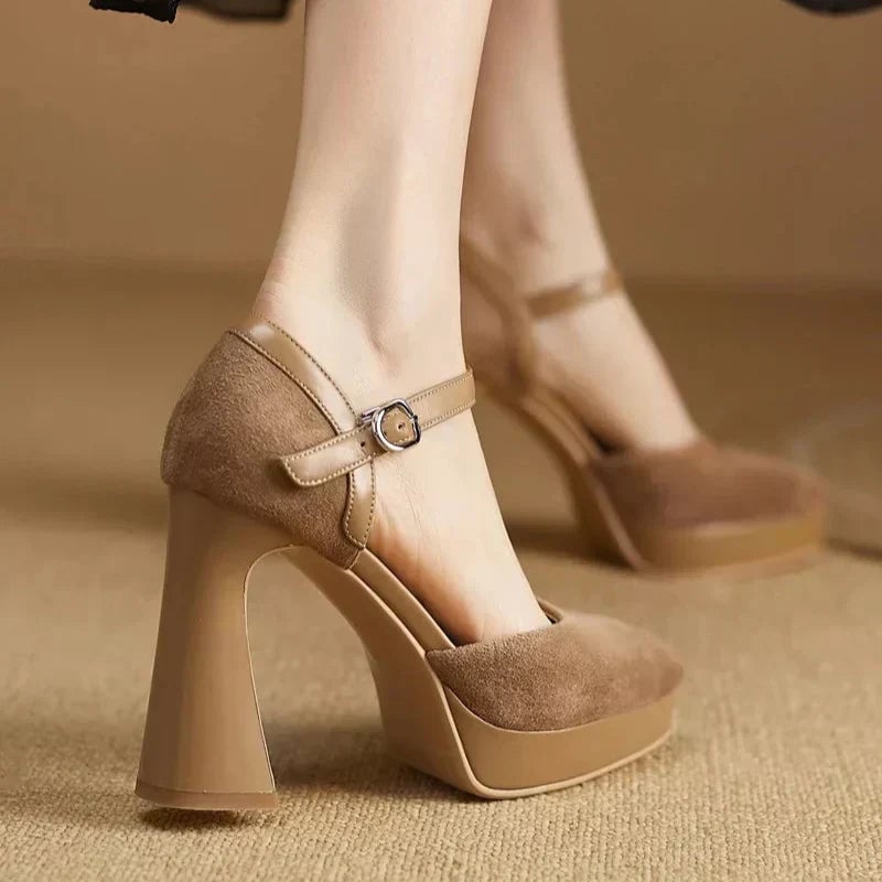 Aurore brown platform pump, rear view highlighting block heel height and ankle strap