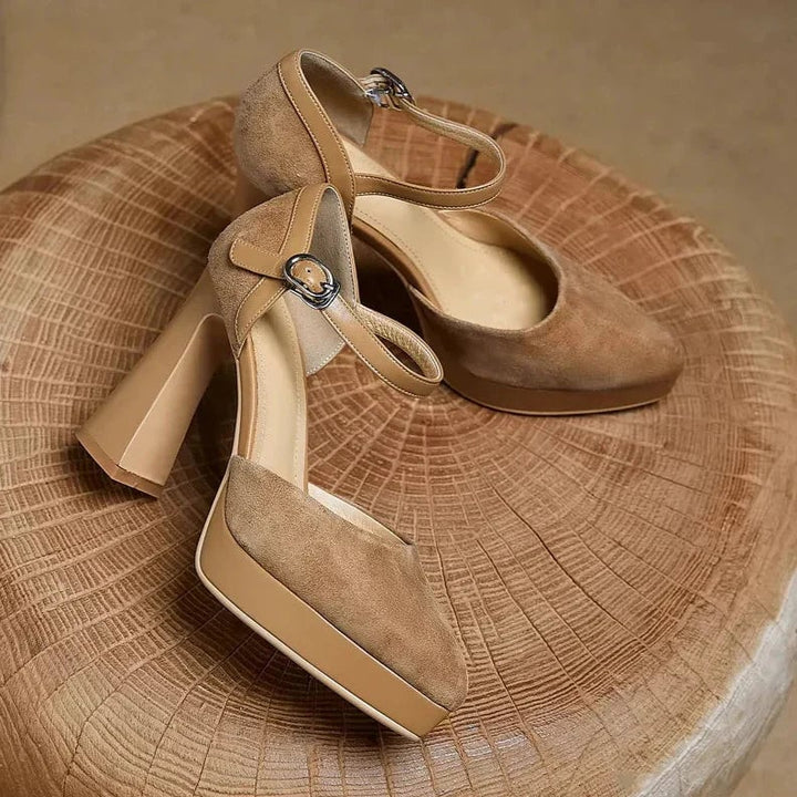 Aurore platform block heel pump pair in brown displayed on a neutral background