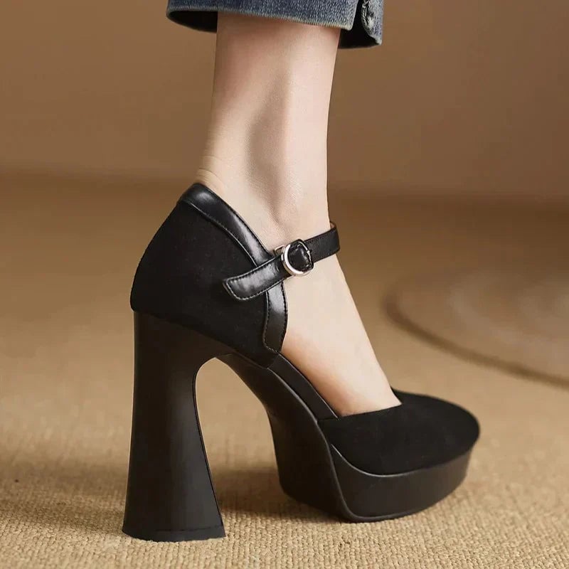 Aurore black pump sole and platform base detail showing heel construction
