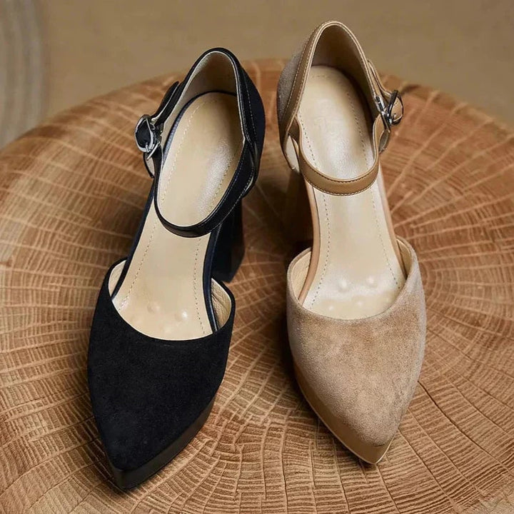 Aurore platform block heel pump pair in black displayed on a neutral background
