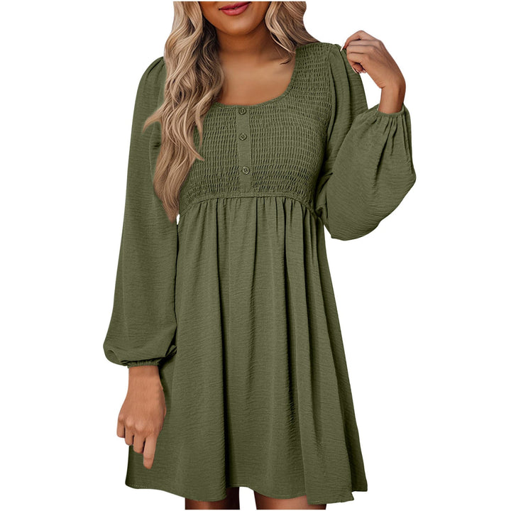 Front view of smocked empire waist mini dress with balloon long sleeves in green