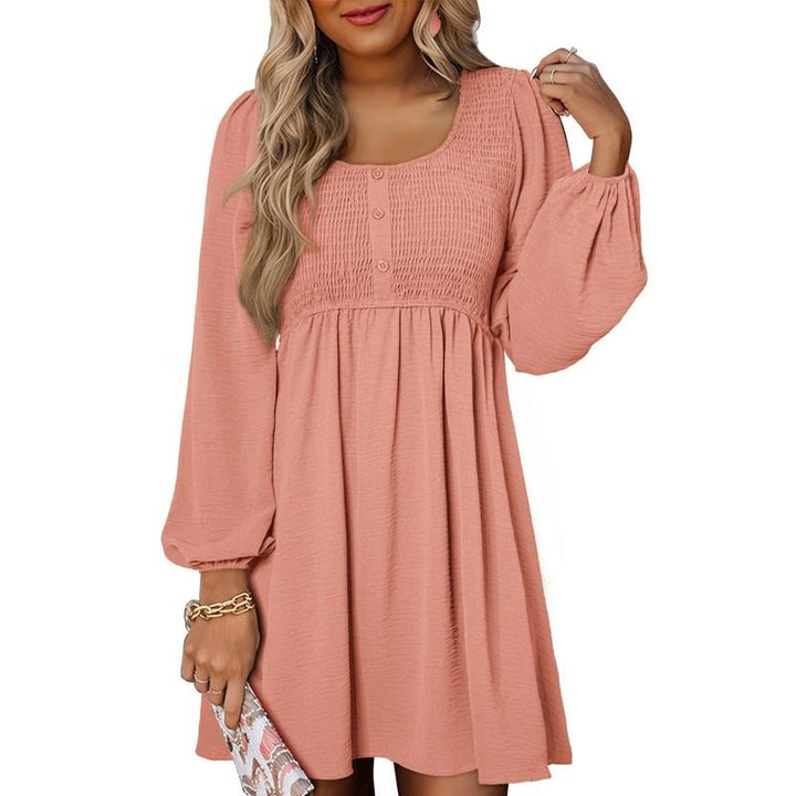 Model wearing smocked balloon sleeve mini dress in dark pink