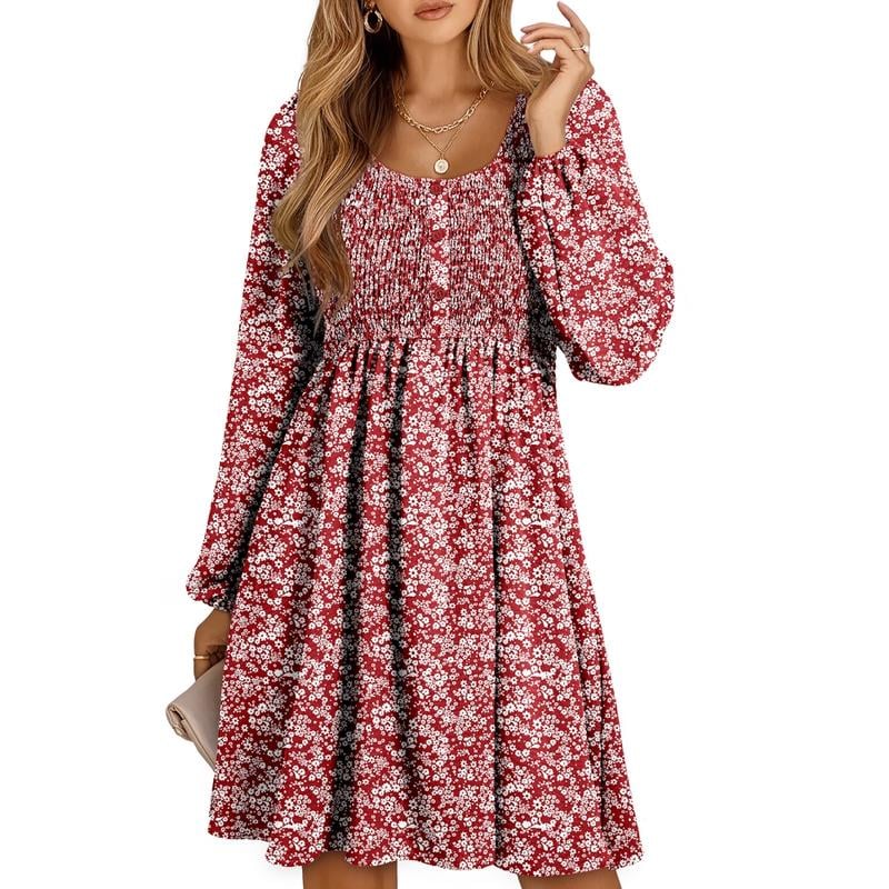 Smocked mini dress styled in navy blue showing full-length silhouette