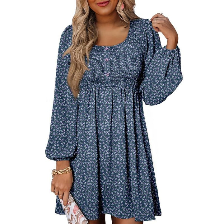 Model wearing smocked balloon sleeve mini dress in pink