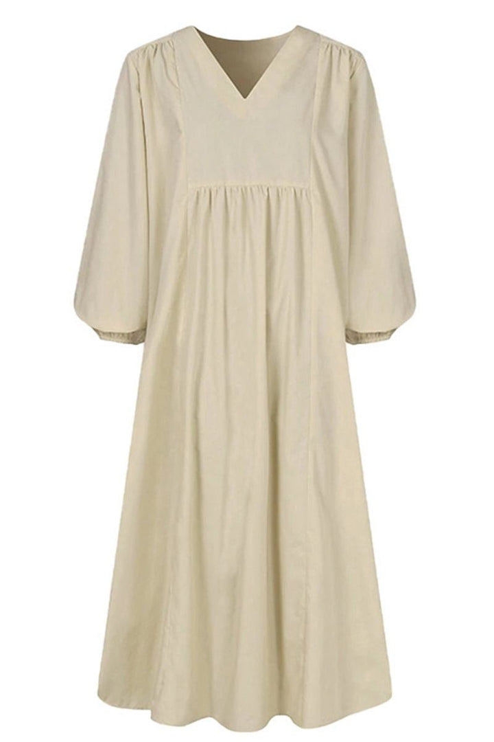 Flat lay of all three color options — red brick, black, and white — of the smocked midi dress
