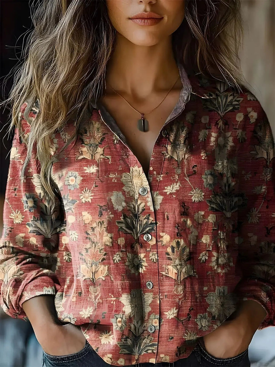 Women's vintage floral shirt in ocean blue worn open as a layering piece over a white tee