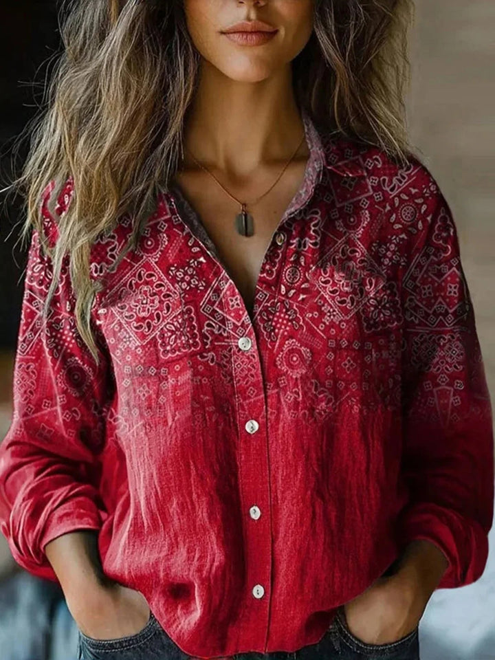 Women's vintage botanical print shirt in olive green showing hem and sleeve cuff detail