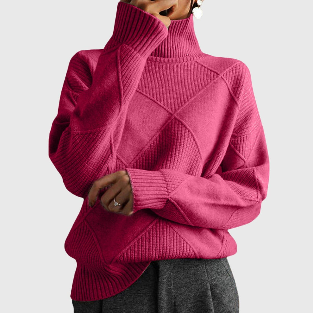 Woman wearing a soft rose turtleneck sweater with a classic high-neck design and flattering fit