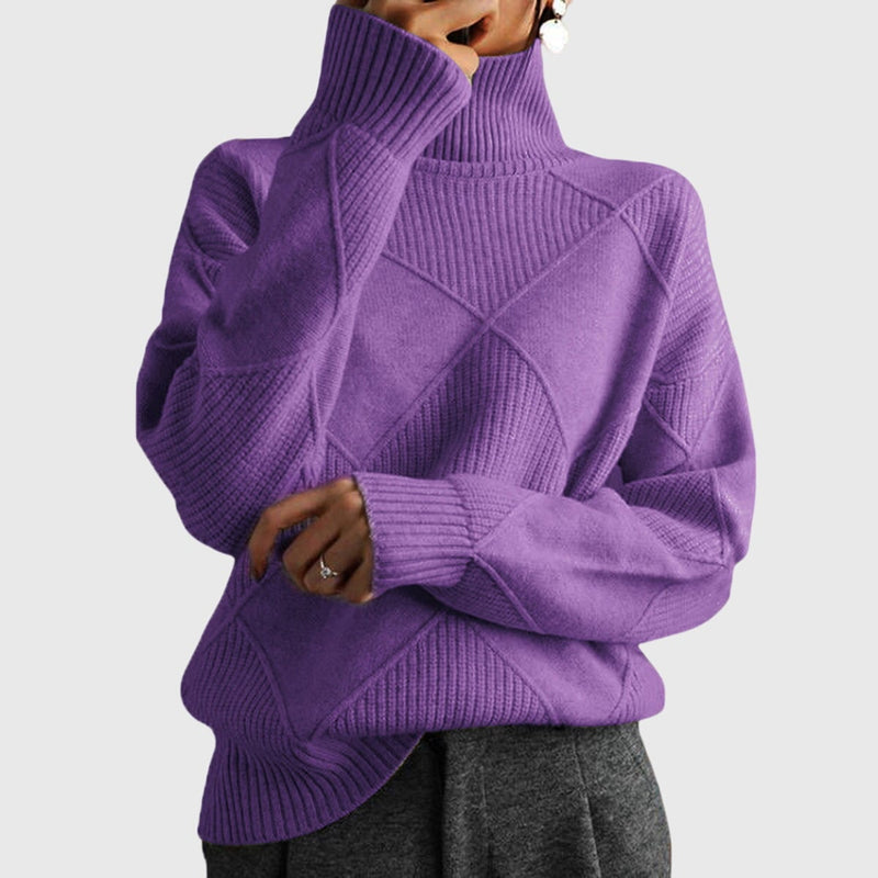 Close-up of the Avery turtleneck sweater showing fabric texture and polished silhouette