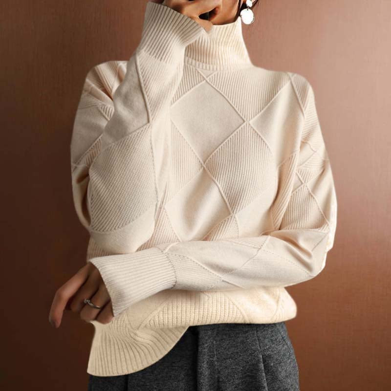 Khaki turtleneck sweater styled with neutral tones for a versatile winter look
