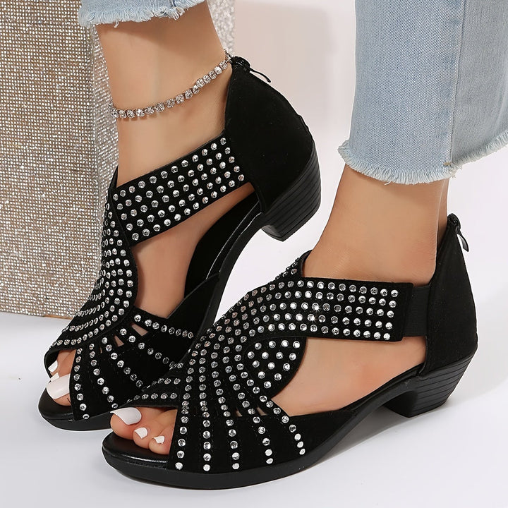 Avery women's adjustable sandals in black, side profile view