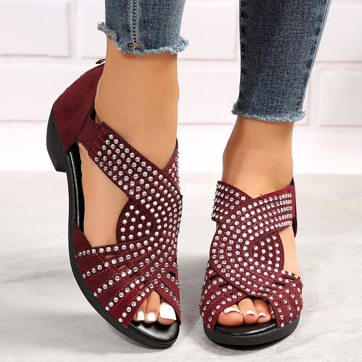 Close-up of shimmer accent detailing on Avery women's sandals