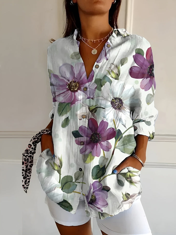 Model in the Avril purple flowers blouse demonstrating versatile everyday styling