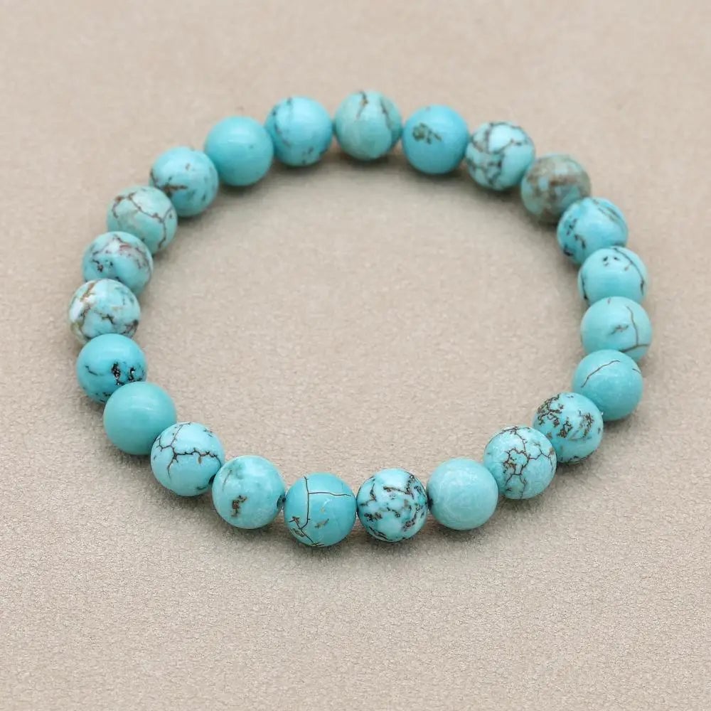 Side view of turquoise bracelet highlighting its shape and finish