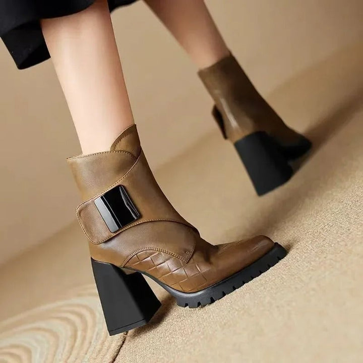 Florimay Aziel boots in black styled with a tailored dress for a polished look