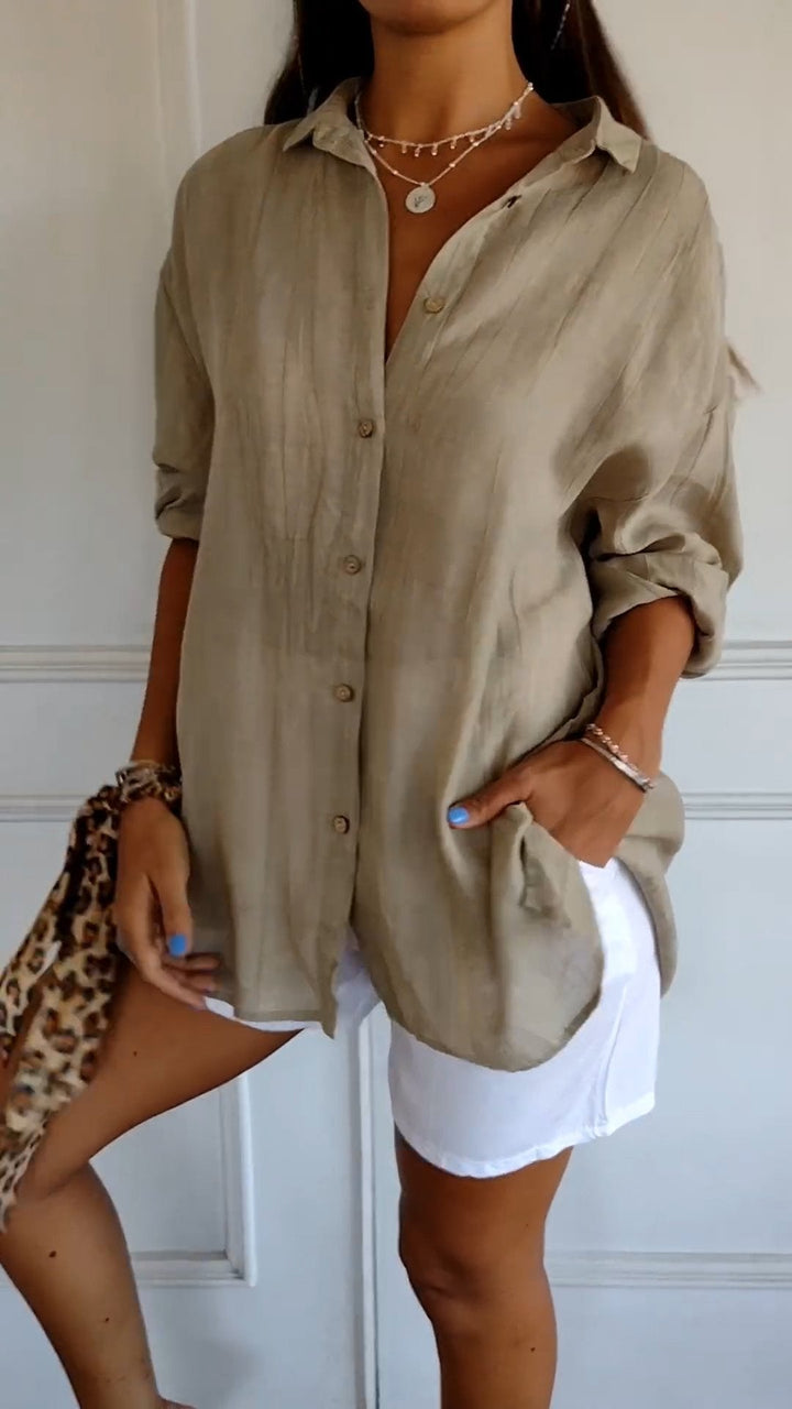 Side view of the Azure oversized casual shirt in blue showing relaxed hip-length silhouette