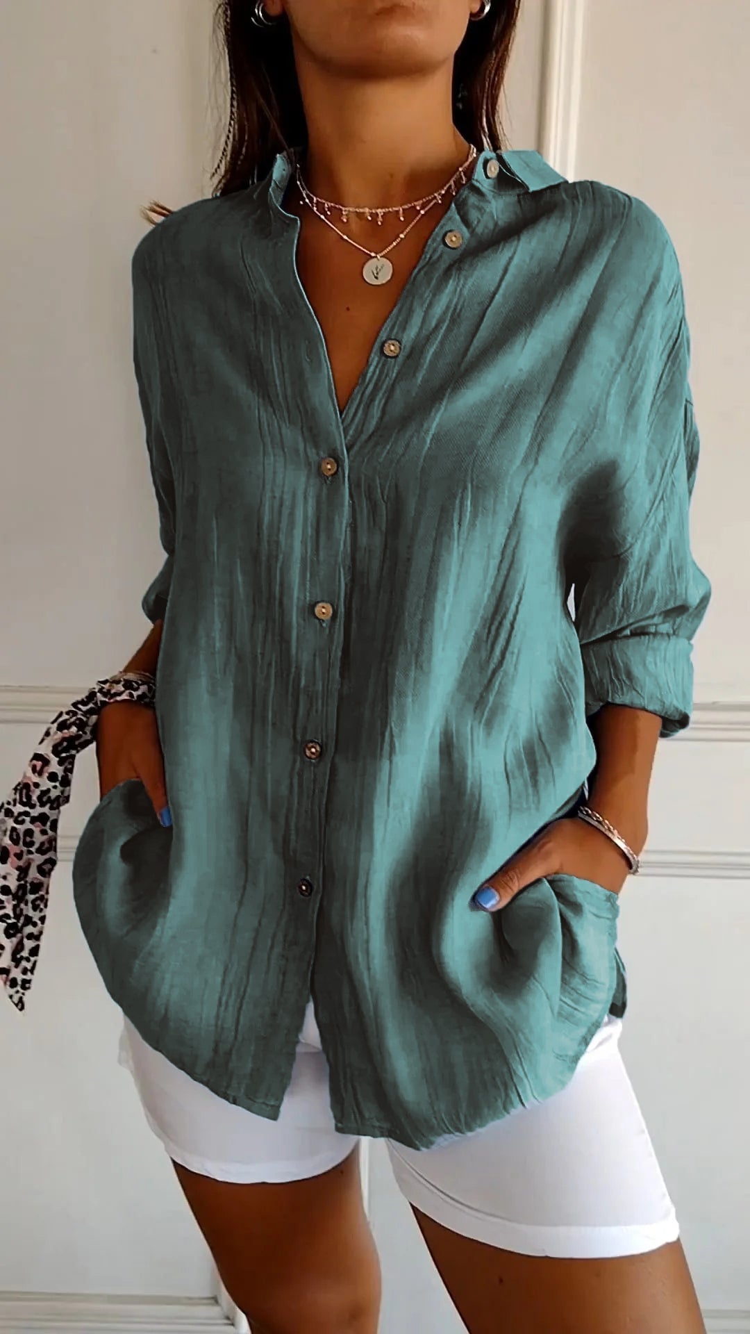Azure casual button-down shirt in pink styled half-tucked into white shorts