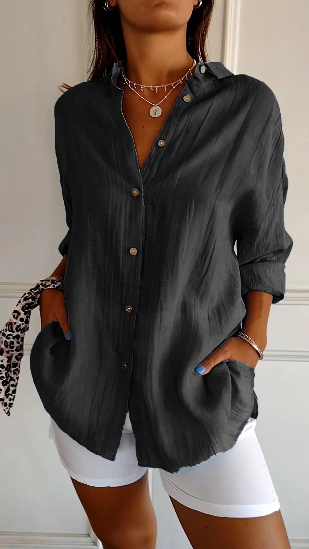 Azure linen-look shirt in green showing crinkle texture detail in natural light