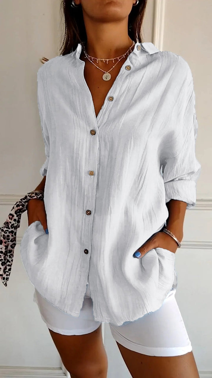 Group flat lay of the Azure oversized casual shirt in multiple color options including blue, pink, and brown