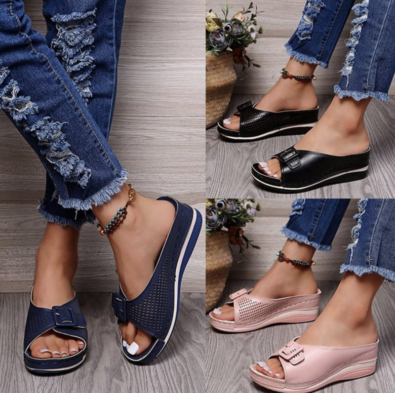Babette orthopedic flat sandal in dark blue shown from the front on a white background