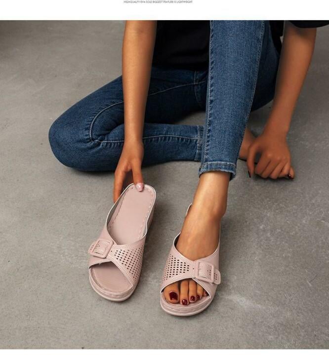 Babette orthopedic flat sandal in dark blue shown from the back