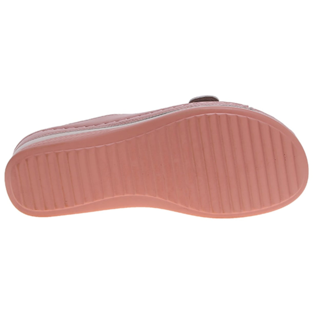 Babette orthopedic flat sandal in black shown from the back