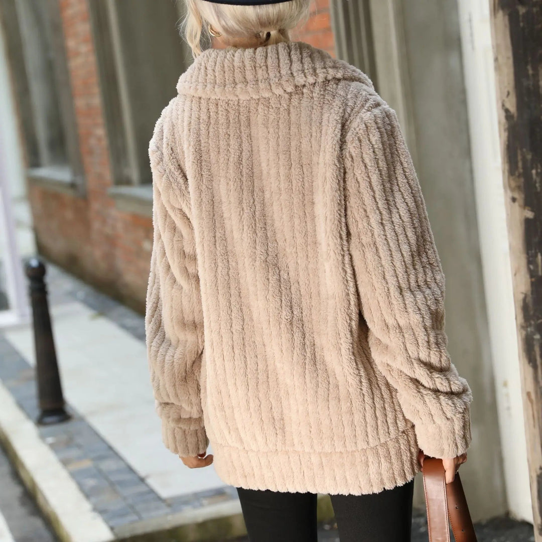 Flat lay of the Bailey elegant jacket showing color and fabric detail