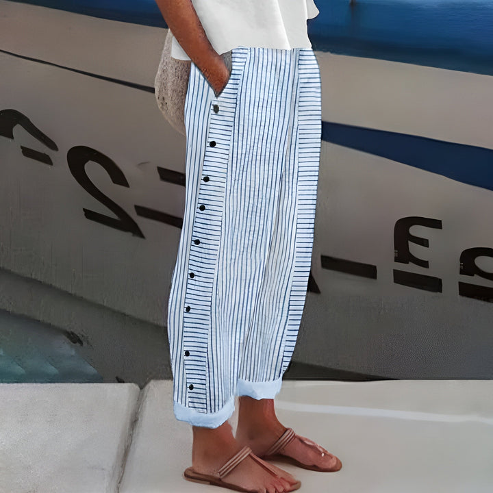 Woman wearing soft straight-leg pants with deep side pockets in a relaxed everyday style
