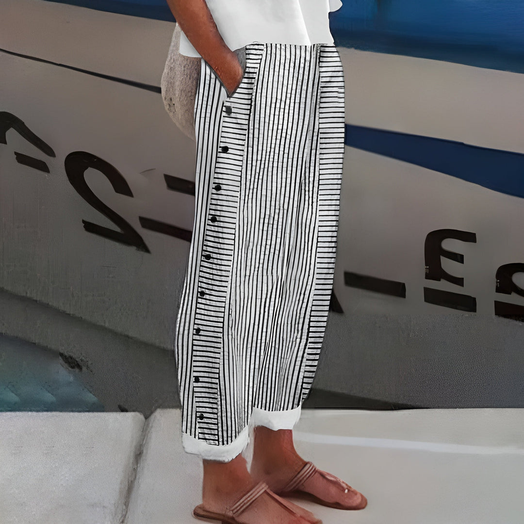 Close-up detail of comfortable women's pants showing elastic waistband and side pocket