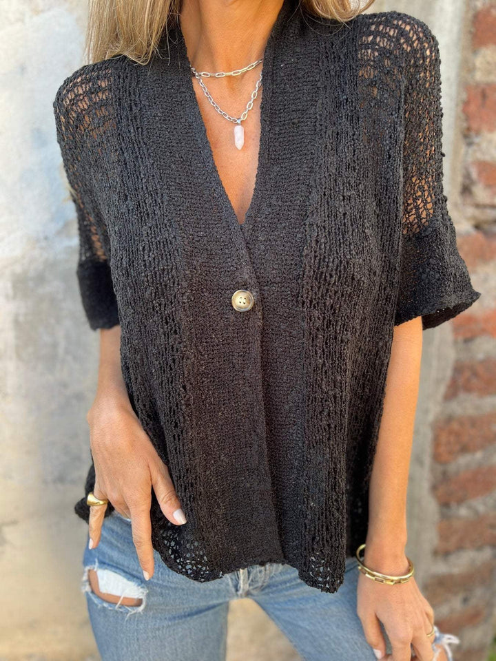 Full-length front view of the textured knit top in white, highlighting the lightweight, breathable design
