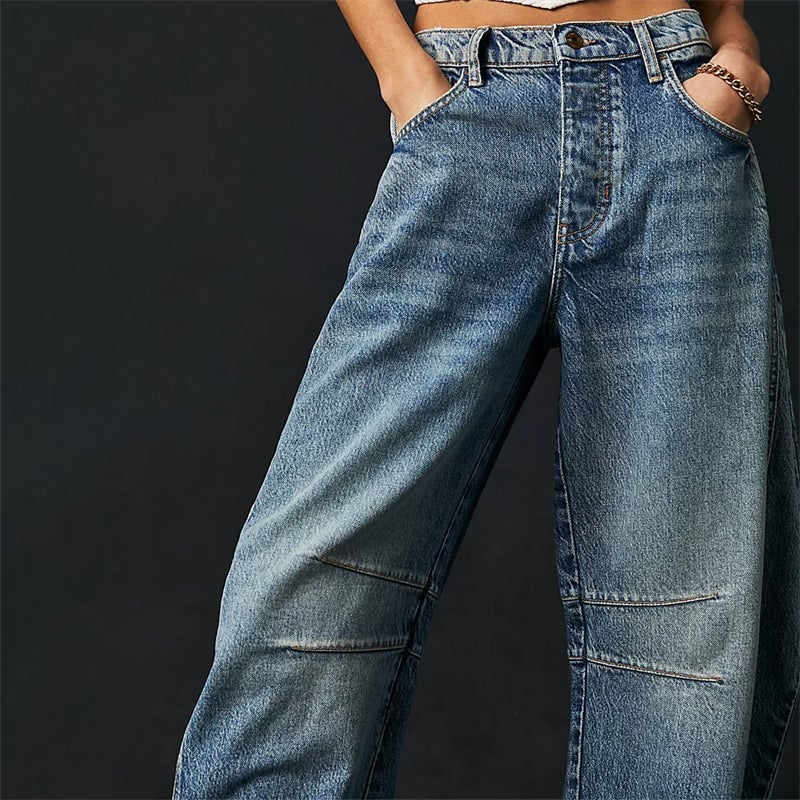 Front view of black high waist barrel leg jeans