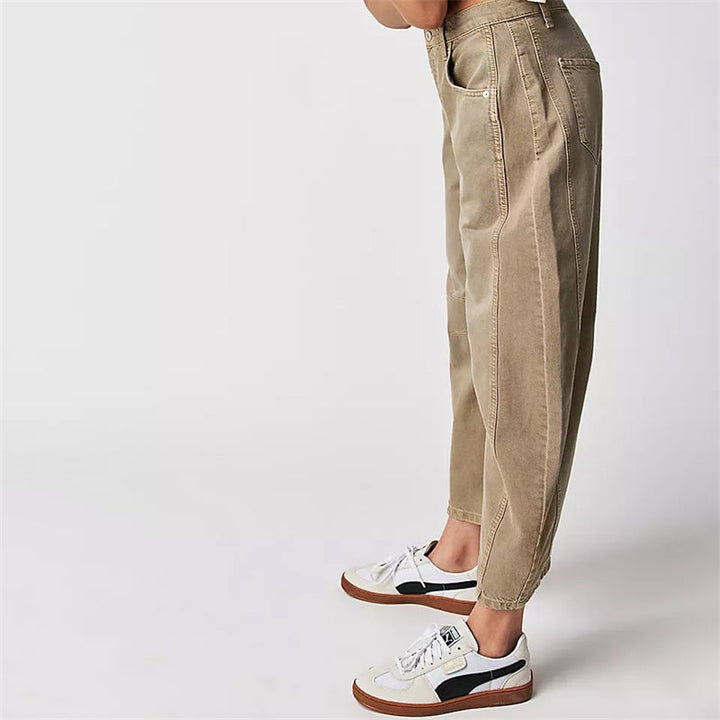 Back view of white relaxed fit barrel leg jeans