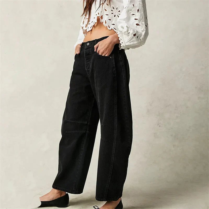 Front view of barrel leg jeans in beige denim