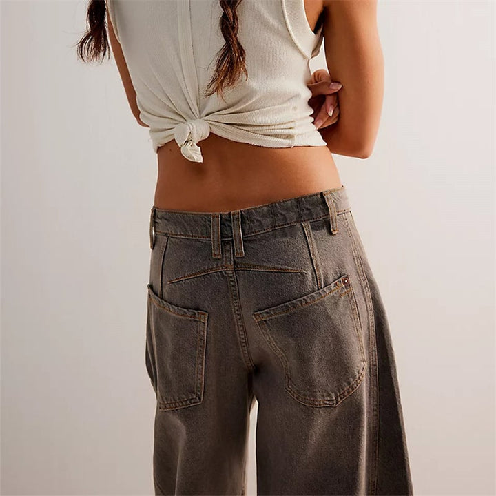 Flat lay of barrel leg jeans showing multiple color options