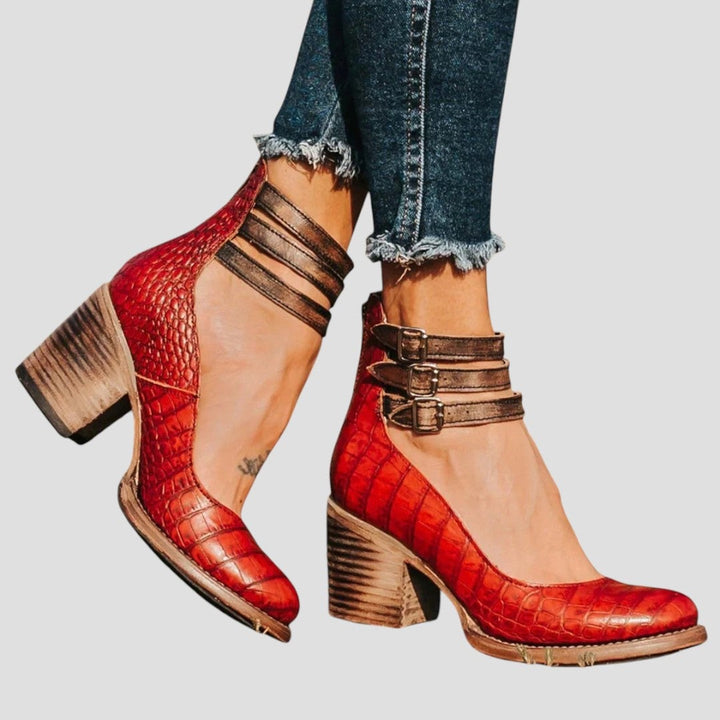 Brown everyday boots shown from a three-quarter angle highlighting smooth contours