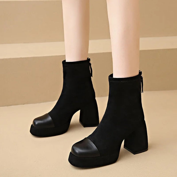 Florimay Bea Vento Boots in black with a sleek sculpted silhouette, shown from the front