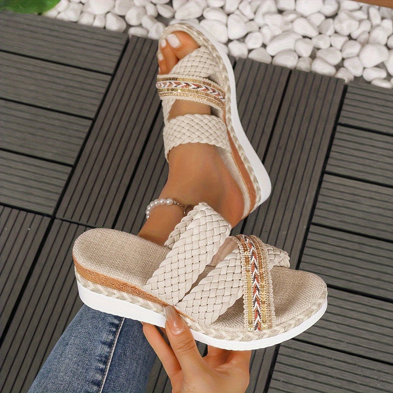 Beatrice ivory white woven rope slip-on sandals shown from the front on a light background