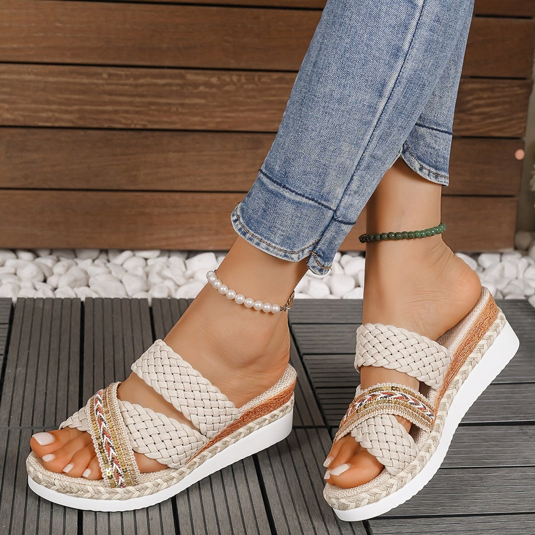 Side profile of Beatrice beige slip-on sandals showing lightweight flexible sole