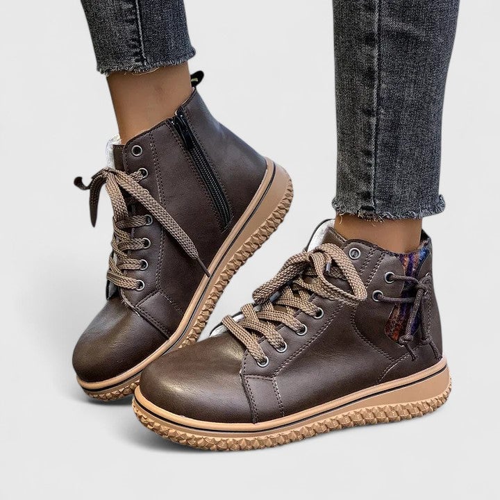 Beatrice ankle boots in blue, front-facing product shot