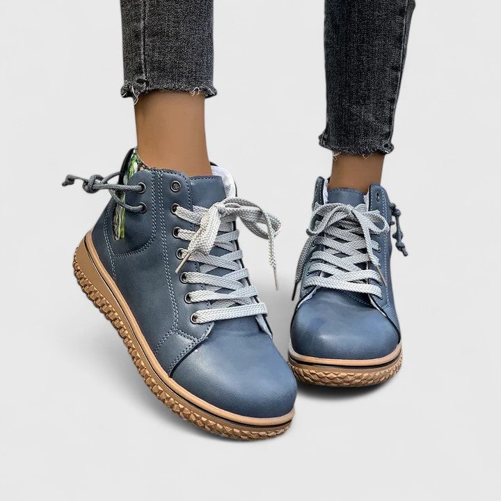 All four color options of the Beatrice ankle boots displayed together