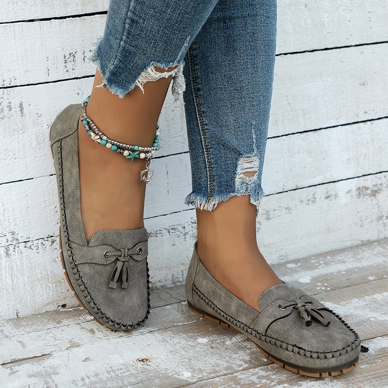 Close-up of cushioned insole inside the blue women's loafers