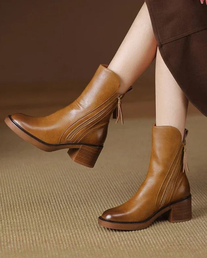 Side profile of Belinda elegant ankle boots in brown showing durable craftsmanship and sleek silhouette