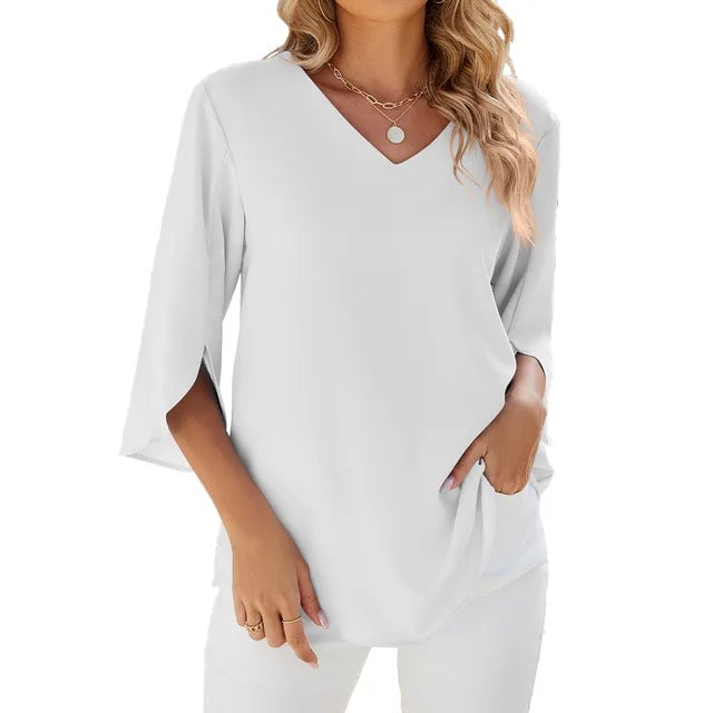 Front view of a lightweight V-neck blouse in white with a flattering neckline and airy fabric