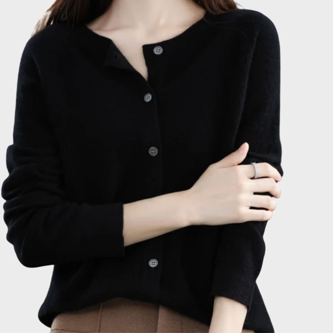 Close-up detail of the Bella cardigan showing premium fabric texture and refined silhouette