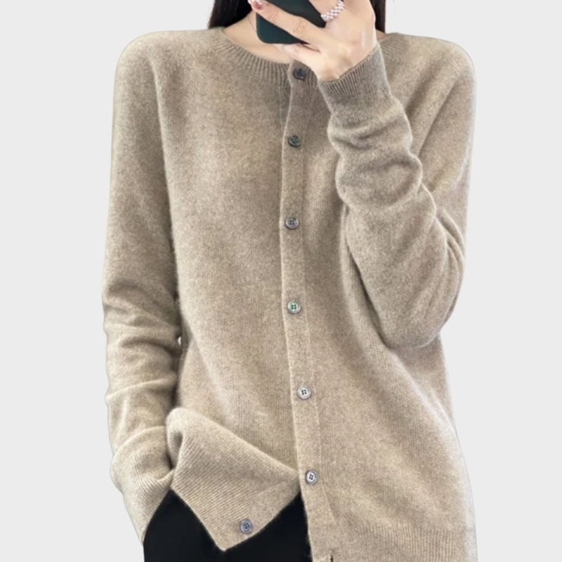 Front view of the Bella cardigan in green, draped elegantly over the model's figure